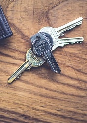 Keys sitting on a table.